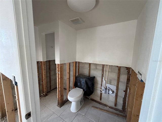 bathroom featuring toilet