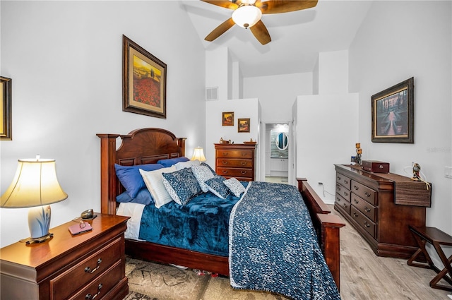 bedroom featuring ceiling fan and light hardwood / wood-style flooring