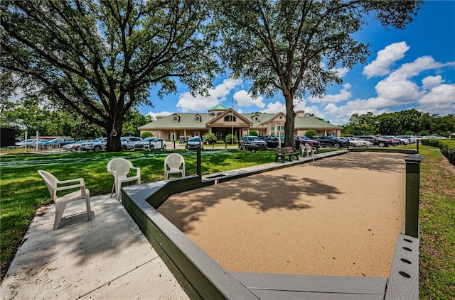 surrounding community featuring a lawn