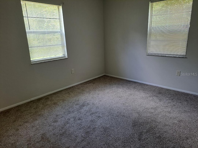 view of carpeted spare room