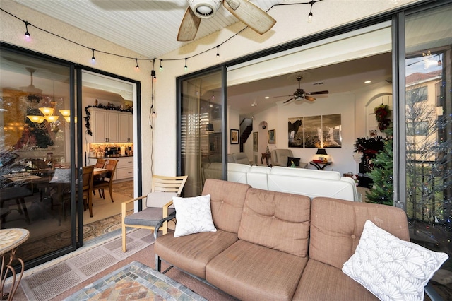 living room featuring ceiling fan