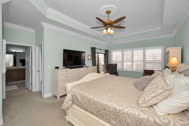 bedroom with a raised ceiling, ceiling fan, and ornamental molding