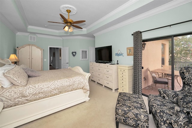 carpeted bedroom with access to outside, a raised ceiling, ceiling fan, and crown molding