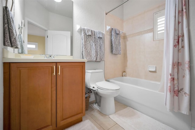 full bathroom featuring tile patterned floors, vanity, shower / bathtub combination with curtain, and toilet