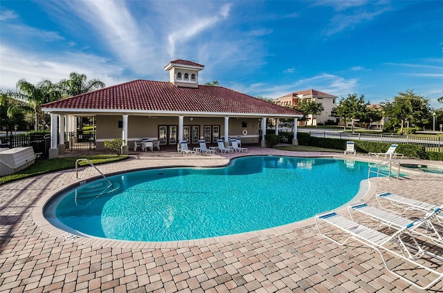 view of swimming pool featuring a patio