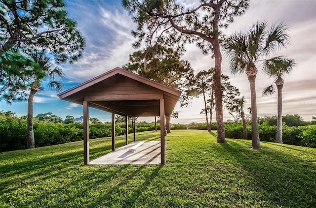 view of property's community featuring a gazebo and a lawn