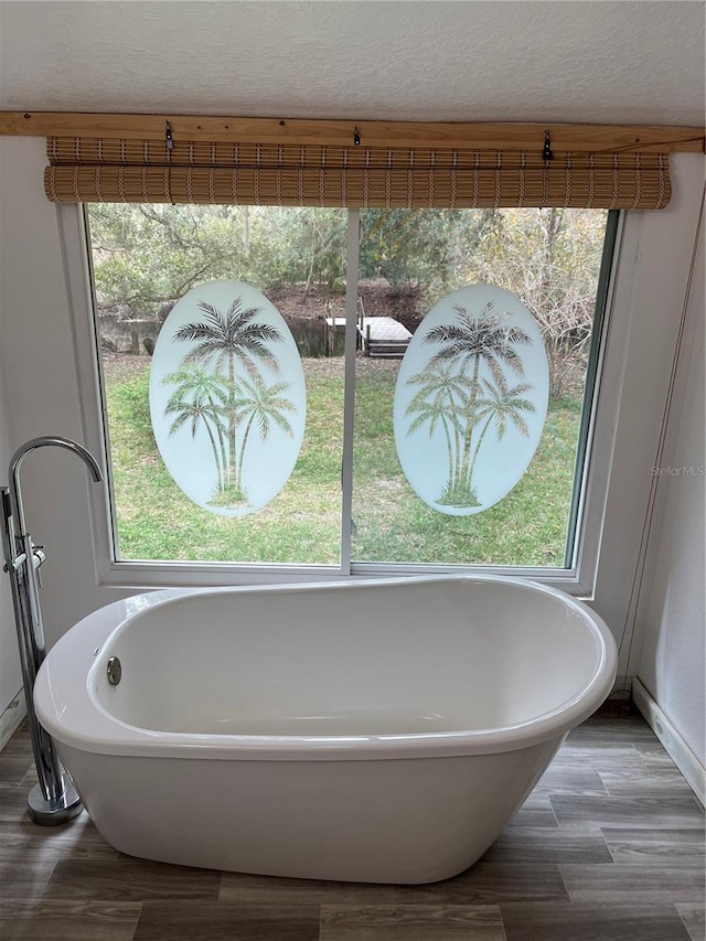 bathroom with a washtub