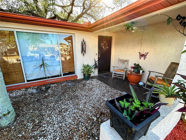 entrance to property with a patio area