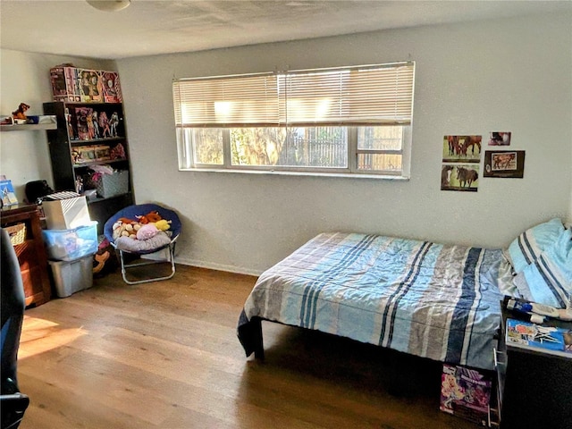 bedroom featuring light hardwood / wood-style floors