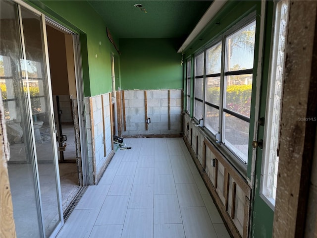 view of unfurnished sunroom