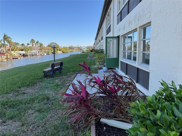 view of yard featuring a water view