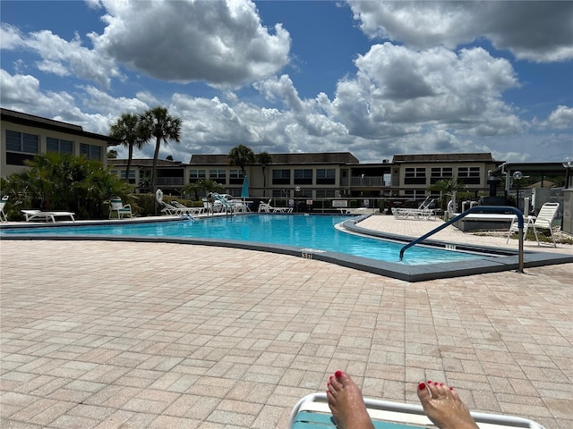 view of pool featuring a patio area