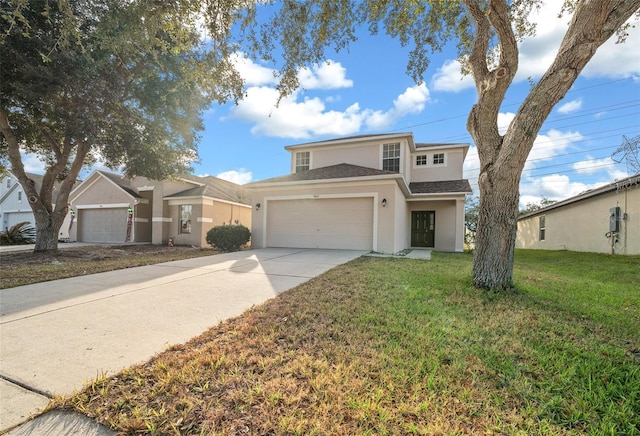 view of front of house featuring a front yard and a garage