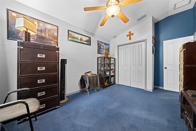 misc room featuring dark colored carpet, vaulted ceiling, and ceiling fan