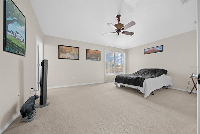 bedroom with light colored carpet and ceiling fan