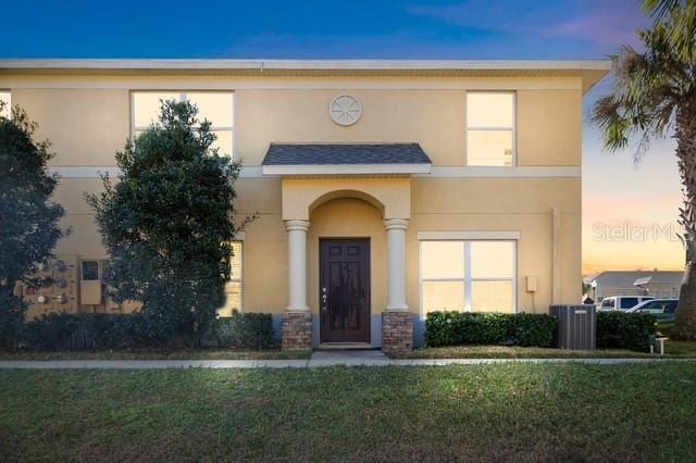 view of front of home with a lawn