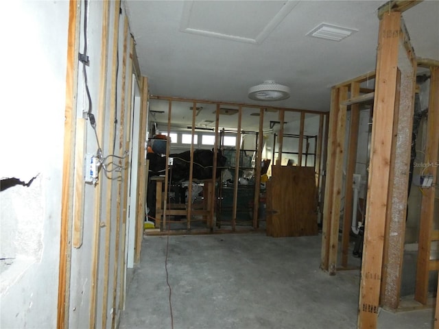 misc room with concrete flooring