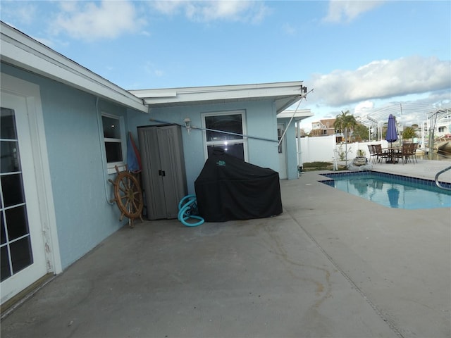 view of pool with a patio