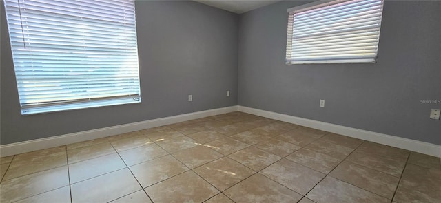 view of tiled spare room