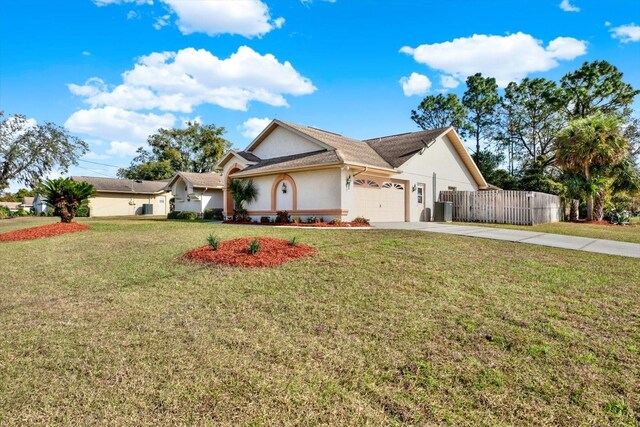 view of front of home featuring a garage and a front yard