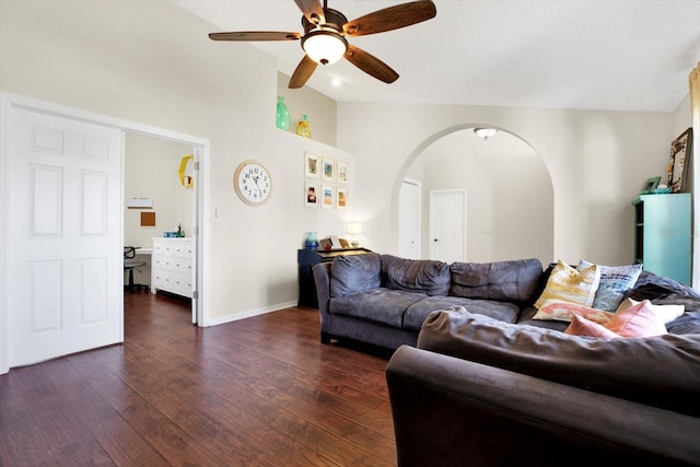 living room with ceiling fan, dark hardwood / wood-style flooring, and vaulted ceiling