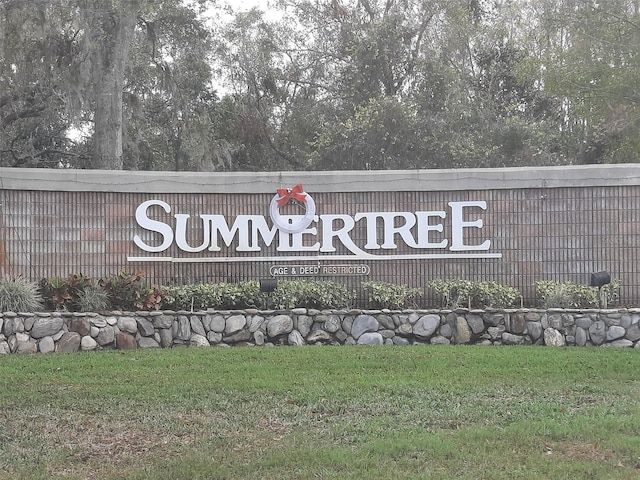 view of community sign