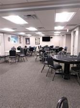 view of carpeted dining space