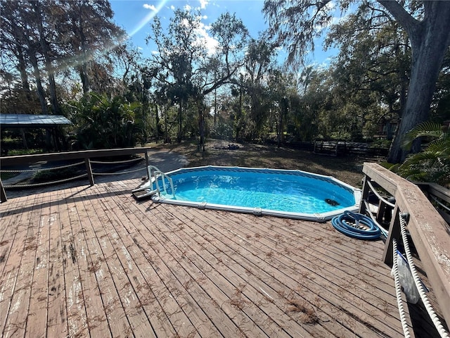 view of pool featuring a deck