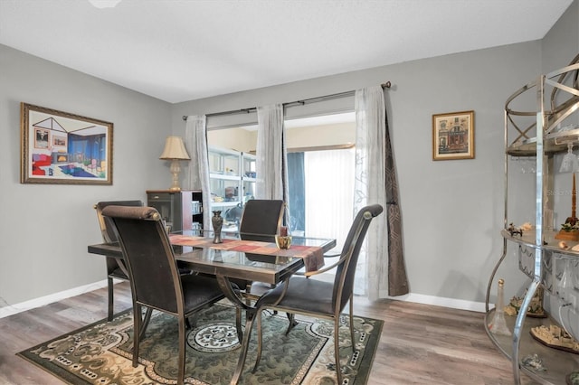 dining room featuring hardwood / wood-style flooring