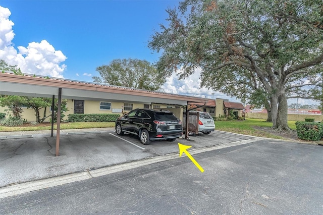 view of car parking with a carport