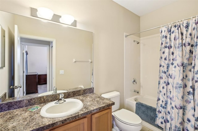 full bathroom with shower / tub combo, vanity, and toilet