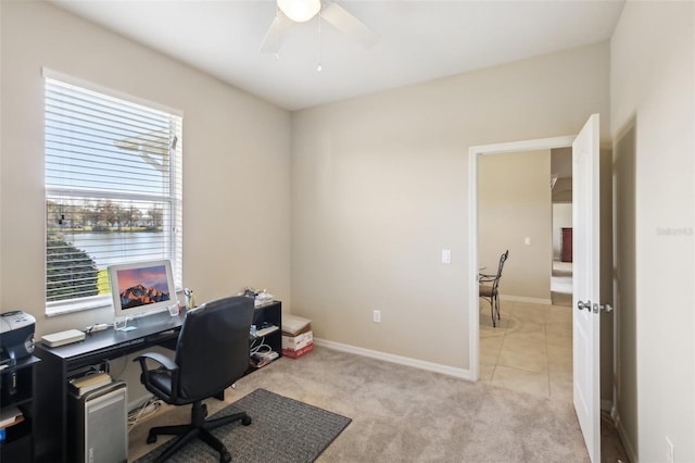 office area with ceiling fan and light colored carpet