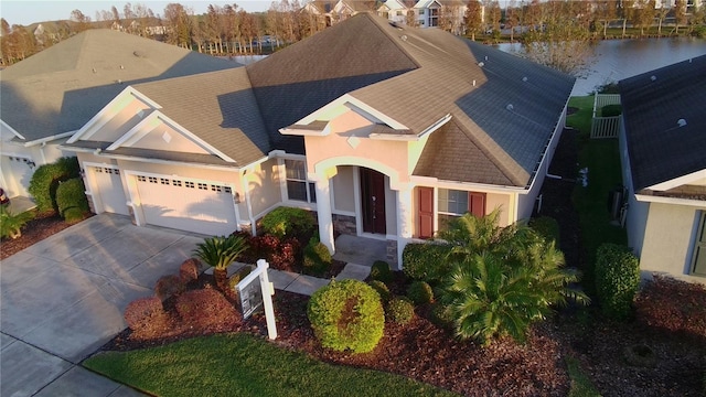 view of front of house featuring a water view