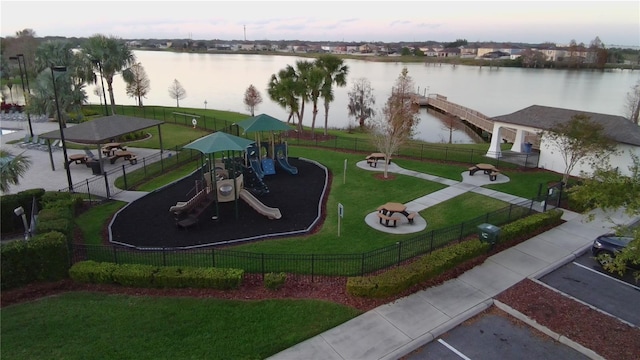 aerial view at dusk with a water view