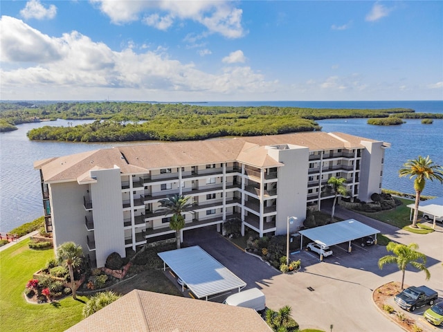 drone / aerial view with a water view