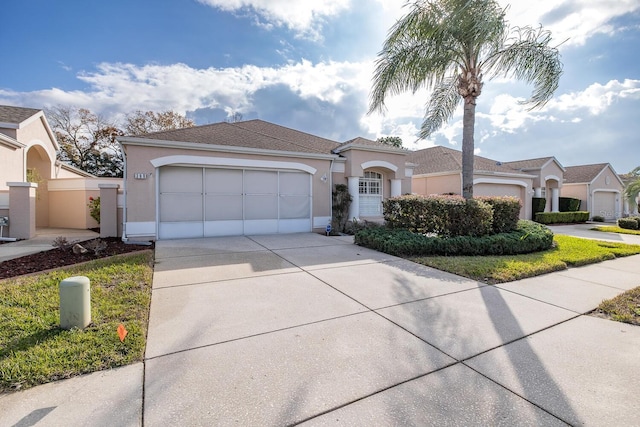 single story home featuring a garage