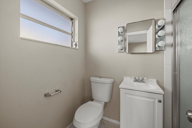 106 Aurora St E, Venice, FL 34285 - bathroom with an enclosed shower, toilet, baseboards, and vanity