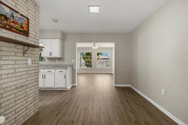 106 Aurora St E, Venice, FL 34285 - kitchen featuring white cabinets, ceiling fan, open shelves, baseboards, and dark wood-style floors