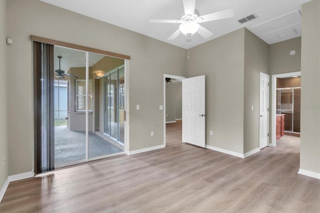 unfurnished room with ceiling fan and light wood-type flooring