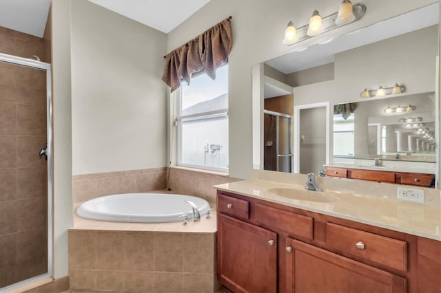 bathroom with vanity and plus walk in shower