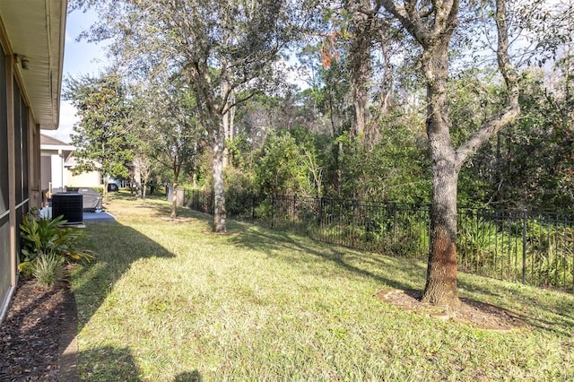 view of yard with central AC