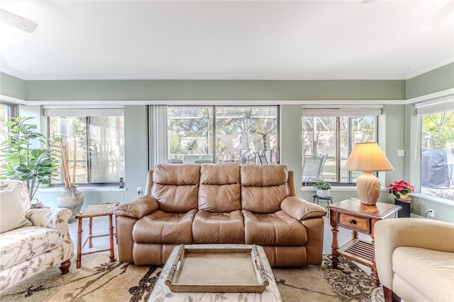 sunroom with ceiling fan