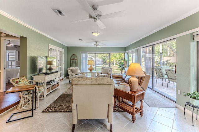 interior space featuring ceiling fan and ornamental molding