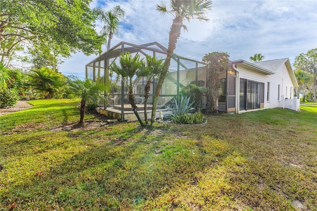 view of yard with a lanai