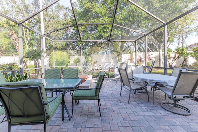 view of patio / terrace with a lanai