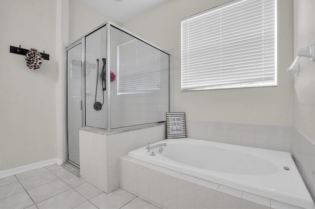 bathroom with tile patterned flooring and plus walk in shower