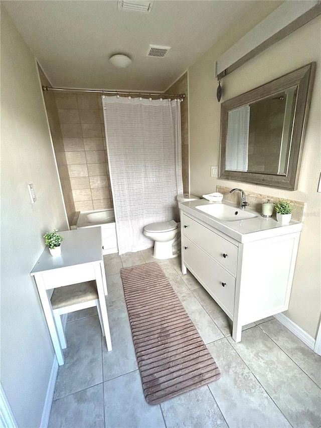 full bathroom with tile patterned flooring, shower / tub combo with curtain, vanity, and toilet