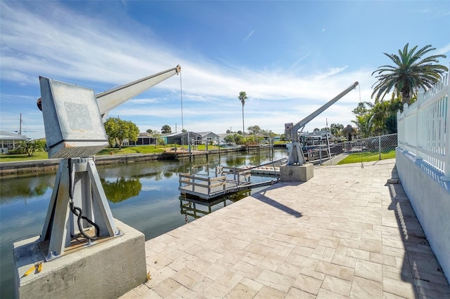 dock area with a water view