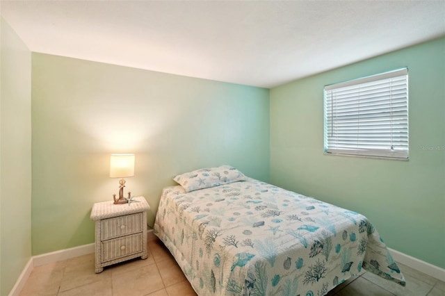 bedroom featuring light tile patterned floors