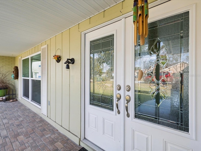 entrance to property with covered porch